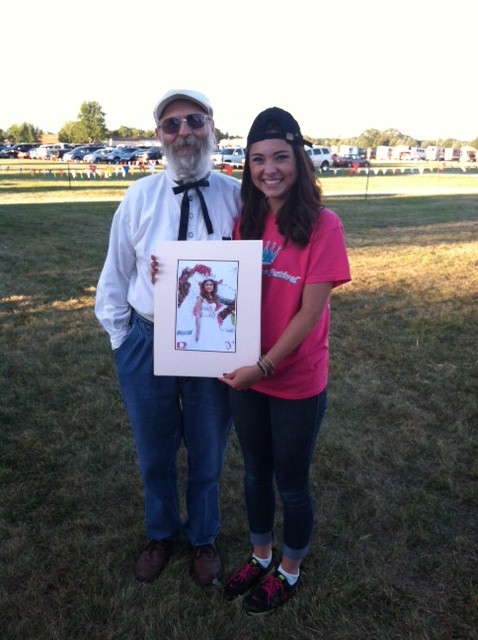Ron Taylor from The House of David and Miss Blossomtime at the Berrien County Youth Fair softball game on Wednesday, August 14th. Our annual match of Royals against The House of David ended in a tie!